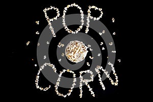 Popped Popcorn maize kernels and shaped in the word Ã¢â¬ËpopcornÃ¢â¬â¢